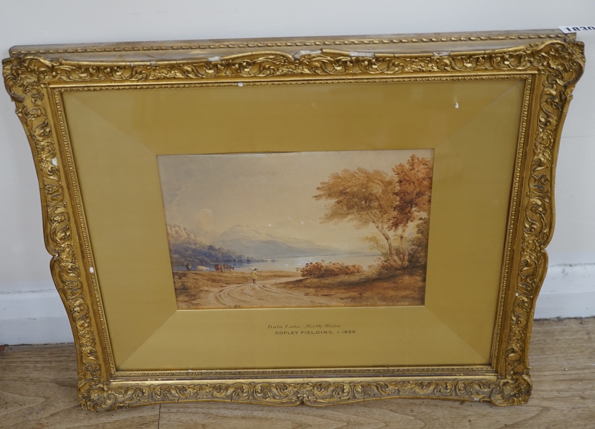 Circle of Copley Fielding (1787-1855), watercolour, 'Bala lake, North Wales with shepherd, cattle and mountains beyond', stencil verso, 17 x 25cm, gilt framed. Condition - fair, faded